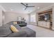 Comfortable living room featuring a sectional sofa, and natural light at 10234 E Lomita Ave, Mesa, AZ 85209