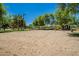 A public sand volleyball court with net strung up, with ample space for recreational sports at 10234 E Lomita Ave, Mesa, AZ 85209