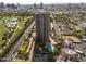An aerial view of a high rise building with swimming pool, landscaping and city views at 1040 E Osborn Rd # 1103, Phoenix, AZ 85014