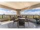 Spacious balcony provides city views, a dining set and plant accents at 1040 E Osborn Rd # 1103, Phoenix, AZ 85014