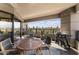 Expansive balcony with city views, a dining set and outdoor grill at 1040 E Osborn Rd # 1103, Phoenix, AZ 85014