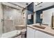 Modern bathroom featuring a sleek glass shower, contemporary fixtures, and stylish vanity for a spa-like experience at 1040 E Osborn Rd # 1103, Phoenix, AZ 85014