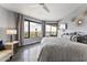 Bright bedroom features city views, modern decor, and a comfortable bed near a cozy seating area at 1040 E Osborn Rd # 1103, Phoenix, AZ 85014