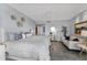 Comfortable bedroom features a soft queen bed, decorative wall art, and a comfortable lounge area at 1040 E Osborn Rd # 1103, Phoenix, AZ 85014