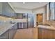Modern kitchen featuring sleek countertops, stainless steel appliances, and ample cabinet space at 1040 E Osborn Rd # 1103, Phoenix, AZ 85014