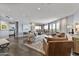 Modern living room with large windows and access to the balcony at 1040 E Osborn Rd # 1103, Phoenix, AZ 85014