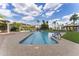 Beautiful community pool with lush landscaping, comfortable lounge chairs, and a relaxing atmosphere for residents at 1040 E Osborn Rd # 1103, Phoenix, AZ 85014