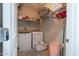 Bright laundry room featuring a side-by-side washer and dryer set and ample storage space at 10850 W Bronco Trl, Peoria, AZ 85383