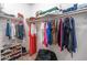 Walk-in closet with ample hanging space, shelving, and storage solutions for organization at 10850 W Bronco Trl, Peoria, AZ 85383