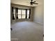 Spacious bedroom with neutral walls, carpet, and large windows providing natural light at 11001 Clear Water --, Goodyear, AZ 85338