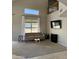 Sunlit living room features high ceilings, a large window, carpeted floors, and neutral walls at 11001 Clear Water --, Goodyear, AZ 85338