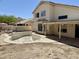A pool and covered patio provide outdoor living and entertaining, next to the home's exterior at 11001 Clear Water --, Goodyear, AZ 85338