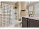 Full bathroom features a shower-tub combo and modern vanity at 13811 W Paso Trl, Peoria, AZ 85383