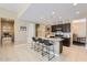Kitchen featuring granite island with seating, stainless appliances and recessed lighting at 13811 W Paso Trl, Peoria, AZ 85383