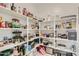 Well-stocked pantry with ample shelving offering generous storage for groceries and household essentials at 13811 W Paso Trl, Peoria, AZ 85383