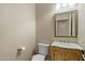 Elegant powder room with decorative mirror and fixtures at 1507 E Treasure Cove Dr, Gilbert, AZ 85234