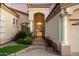 Grand entrance showcasing an arched doorway and decorative iron gate at 1507 E Treasure Cove Dr, Gilbert, AZ 85234