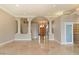 Open living room with marble flooring and decorative pillars at 1507 E Treasure Cove Dr, Gilbert, AZ 85234