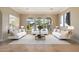 Open living room features elegant furnishings and backyard views at 1507 E Treasure Cove Dr, Gilbert, AZ 85234