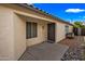 Back porch features a covered entry and desert landscaping at 16044 S 41St Pl, Phoenix, AZ 85048