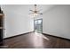Bright bedroom featuring a sliding glass door out to the backyard and ceiling fan at 16044 S 41St Pl, Phoenix, AZ 85048