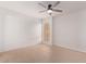 A sunny bedroom featuring a modern ceiling fan at 1701 W Tuckey Ln # 231, Phoenix, AZ 85015
