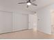 A bright bedroom with an open closet and an exit to the bathroom at 1701 W Tuckey Ln # 231, Phoenix, AZ 85015