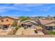 Aerial view of the home's backyard showcasing landscaping and fenced yard at 17418 N Carmen Ave, Maricopa, AZ 85139
