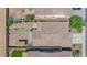 Overhead view of a home's backyard with patio, desert landscaping, and shed at 17418 N Carmen Ave, Maricopa, AZ 85139