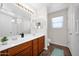 Bathroom featuring dual sinks, and ample counter space, with excellent natural lighting at 17418 N Carmen Ave, Maricopa, AZ 85139