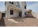 Backyard features a covered patio and low maintenance landscaping at 1750 W Union Hills Dr # 8, Phoenix, AZ 85027
