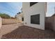 Low maintenance backyard features a covered patio and block wall at 1750 W Union Hills Dr # 8, Phoenix, AZ 85027