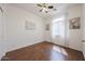 This cozy bedroom is awash with natural light and wood floors at 1750 W Union Hills Dr # 8, Phoenix, AZ 85027