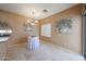Dining room with neutral walls, tile flooring, and decorative wall art at 1750 W Union Hills Dr # 8, Phoenix, AZ 85027