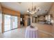 Kitchen and dining area with tile floors, sliding glass doors, and stainless steel refrigerator at 1750 W Union Hills Dr # 8, Phoenix, AZ 85027