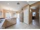 Well-lit kitchen featuring granite countertops, tile floors, and stainless steel refrigerator at 1750 W Union Hills Dr # 8, Phoenix, AZ 85027