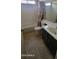 Full bathroom with tiled floor and shower-tub combination at 1835 E Cortez Dr, Gilbert, AZ 85234