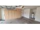 Spacious garage with built-in storage cabinets and room for parking at 1835 E Cortez Dr, Gilbert, AZ 85234