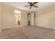The primary bedroom leads to an ensuite bathroom at 18417 W Elm St, Goodyear, AZ 85395