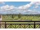 Stunning balcony view overlooking lush golf course, blue skies, and distant city skyline at 2 Biltmore Est # 309, Phoenix, AZ 85016