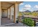 Enjoy stunning mountain views from this spacious balcony with decorative iron railings at 2 Biltmore Est # 309, Phoenix, AZ 85016
