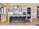 Spacious kitchen featuring a large center island with seating, perfect for entertaining guests at 2 Biltmore Est # 309, Phoenix, AZ 85016