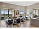 Expansive living and dining area with large windows offering breathtaking outdoor views at 2 Biltmore Est # 309, Phoenix, AZ 85016