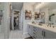 Stylish bathroom showcasing a white vanity and a tiled shower at 2024 W Trotter Trl, Phoenix, AZ 85085