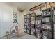 Bedroom equipped with a large bookshelf and quirky decor elements at 2024 W Trotter Trl, Phoenix, AZ 85085