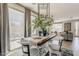 Bright dining area featuring modern decor and seamless access to the outdoor patio, ideal for indoor-outdoor living at 2024 W Trotter Trl, Phoenix, AZ 85085