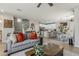 Open floor plan showing the living room flowing into the kitchen and dining area, perfect for entertaining at 2024 W Trotter Trl, Phoenix, AZ 85085
