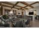 Inviting lounge area featuring wood beams, comfortable seating, and contemporary lighting at 2024 W Trotter Trl, Phoenix, AZ 85085
