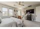 Bright main bedroom with seating area, and access to a walk-in closet at 2024 W Trotter Trl, Phoenix, AZ 85085
