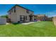 This sprawling backyard features artificial grass, an outdoor patio, and a private fence at 21288 E Via Del Sol --, Queen Creek, AZ 85142